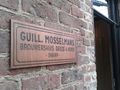 Guill. Mosselmans wall sign outside the remodeled lofts building.